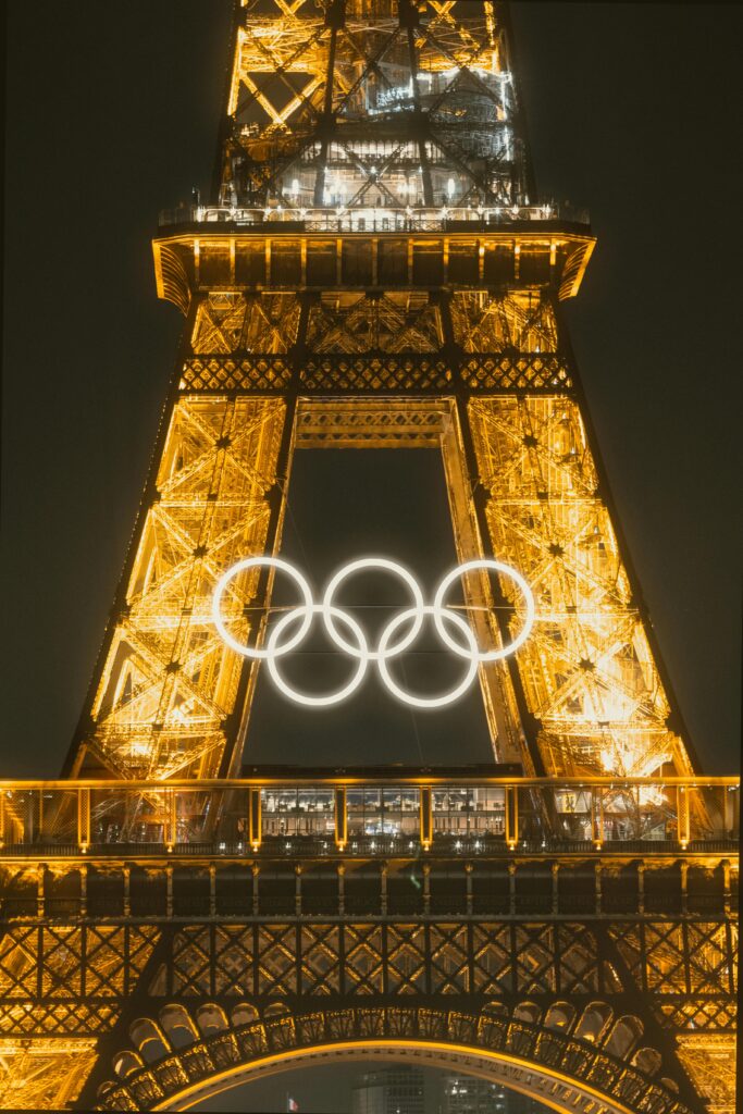 Eiffel Tower at night with Paris 2024 Olympic rings